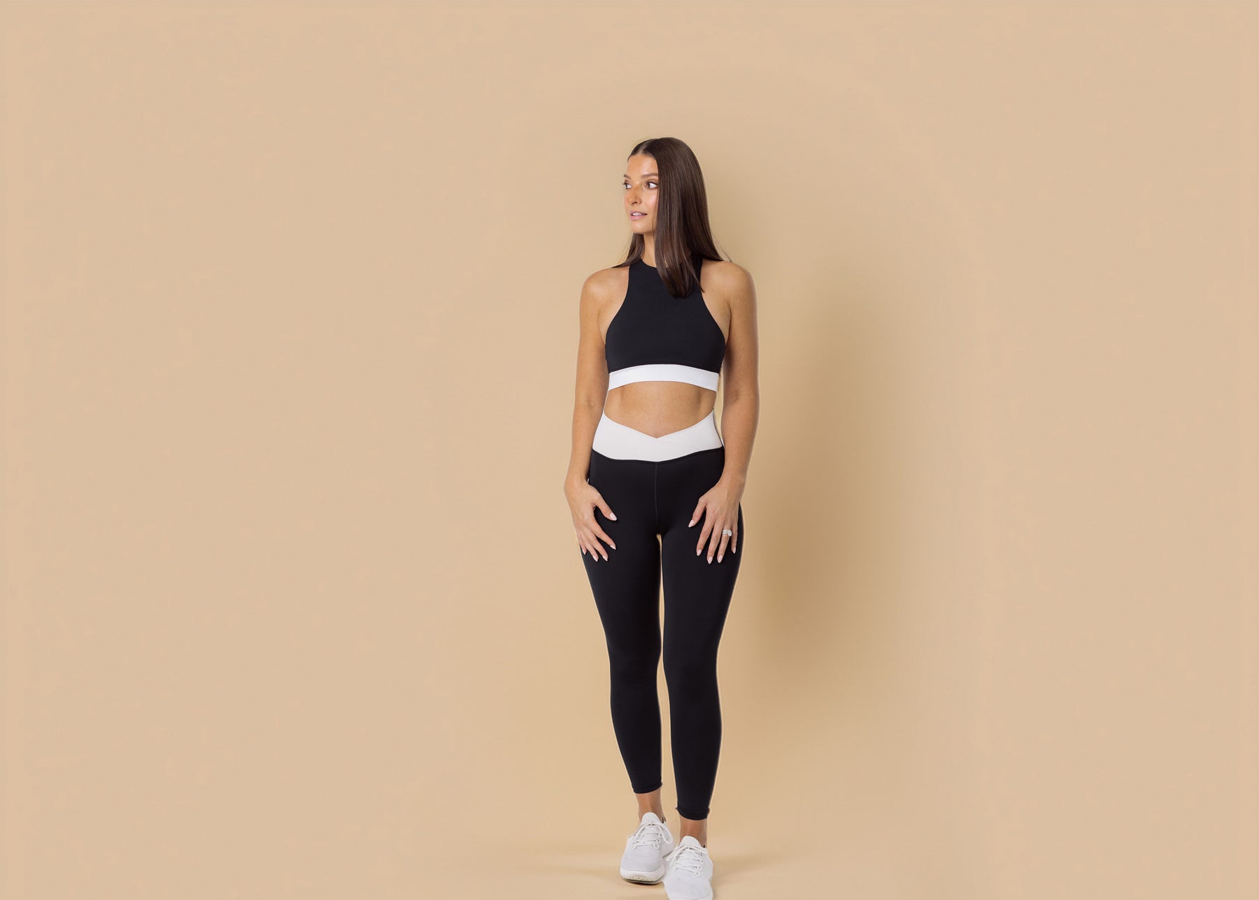 Model wearing The Cheeky Been workout set by Presley Hill